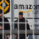 Police officers guard the Madrid-region Amazon warehouse in question during a prior strike in March 2018.